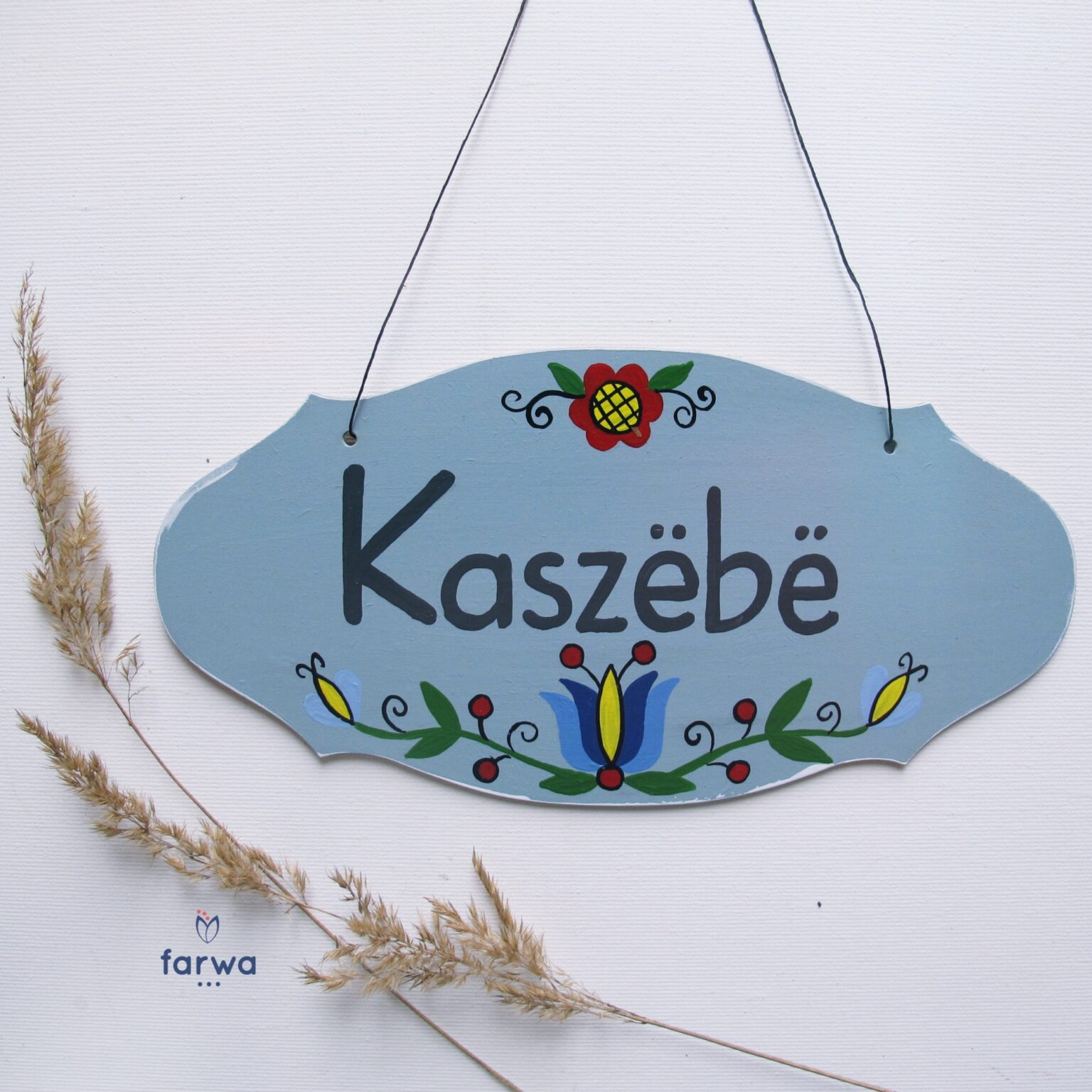 Tabliczka „Kaszëbë” – haft wejherowski